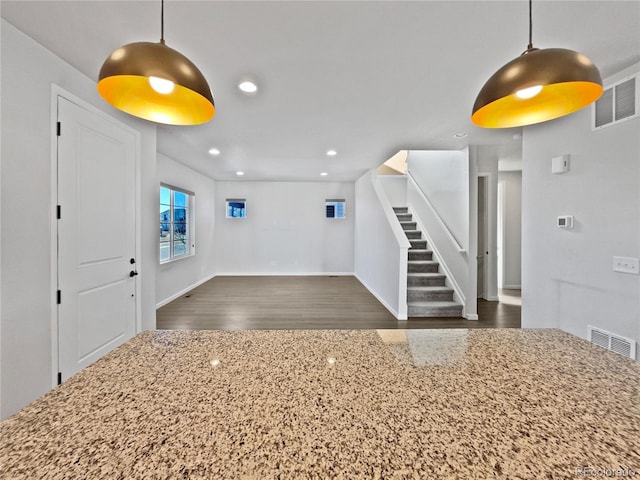 interior space with dark hardwood / wood-style flooring