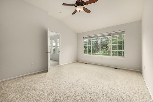 8267 S Sicily Ct, Aurora, CO 80016 - carpeted spare room with vaulted ceiling, ceiling fan, and baseboards