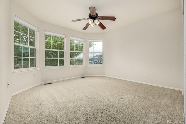 8267 S Sicily Ct, Aurora, CO 80016 - carpeted spare room with baseboards and ceiling fan