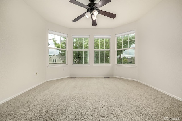 8267 S Sicily Ct, Aurora, CO 80016 - unfurnished room featuring plenty of natural light, carpet, baseboards, and ceiling fan