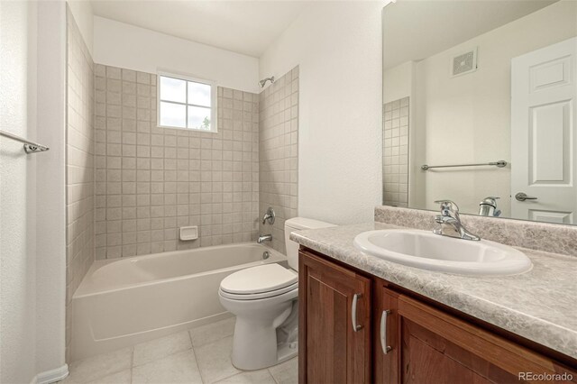 8267 S Sicily Ct, Aurora, CO 80016 - full bathroom with vanity, tile patterned flooring, bathing tub / shower combination, and toilet