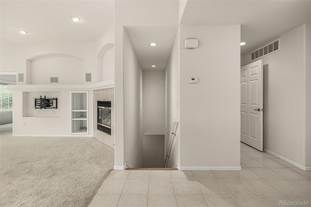8267 S Sicily Ct, Aurora, CO 80016 - hall with built in features, recessed lighting, baseboards, carpet floors, and tile patterned floors