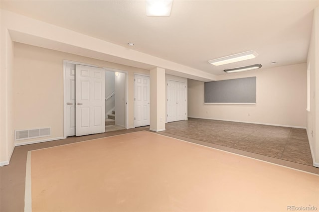 8267 S Sicily Ct, Aurora, CO 80016 - finished basement with baseboards and stairway