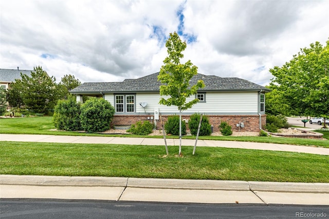 8267 S Sicily Ct, Aurora, CO 80016 - ranch-style house featuring brick siding and a front lawn