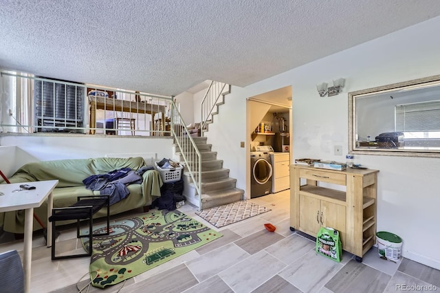 18891 E Carmel Dr, Aurora, CO 80011 - living area with independent washer and dryer, a textured ceiling, and stairs