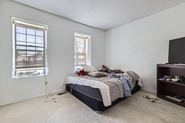 18891 E Carmel Dr, Aurora, CO 80011 - bedroom featuring carpet and a textured ceiling