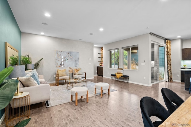 3384 Cranston Cir, Highlands Ranch, CO 80126 - living room with wood finished floors, recessed lighting, and baseboards