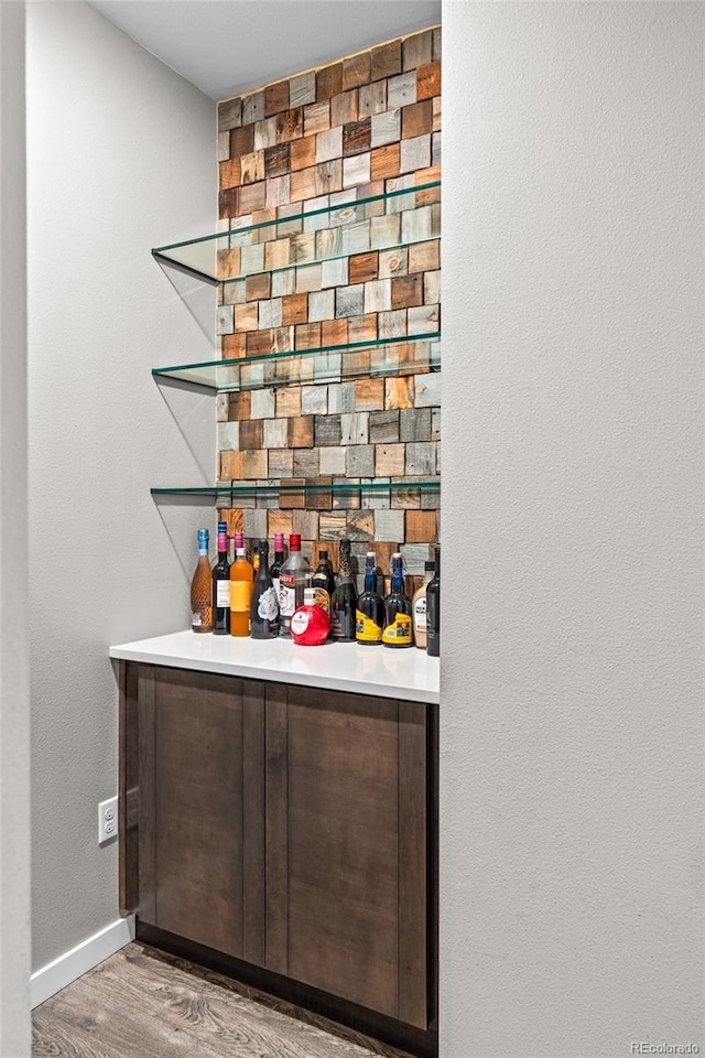 3384 Cranston Cir, Highlands Ranch, CO 80126 - indoor dry bar with baseboards and wood finished floors
