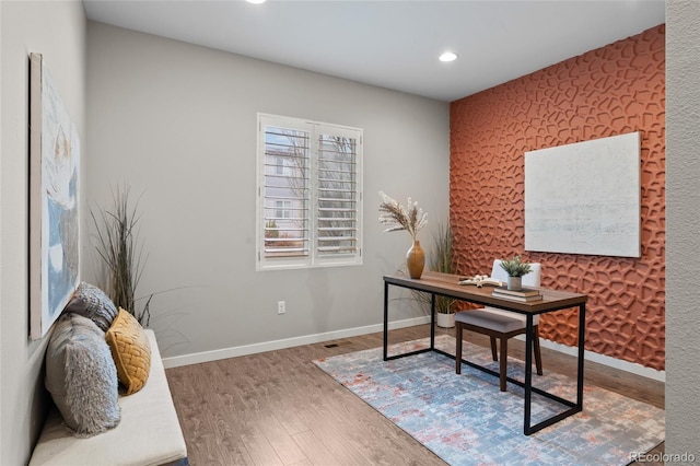 3384 Cranston Cir, Highlands Ranch, CO 80126 - office area featuring recessed lighting, wood finished floors, baseboards, and an accent wall