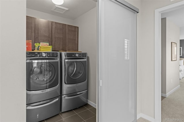 3384 Cranston Cir, Highlands Ranch, CO 80126 - clothes washing area with washing machine and dryer, cabinet space, and baseboards