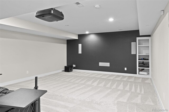 3384 Cranston Cir, Highlands Ranch, CO 80126 - finished below grade area with light colored carpet, recessed lighting, and baseboards