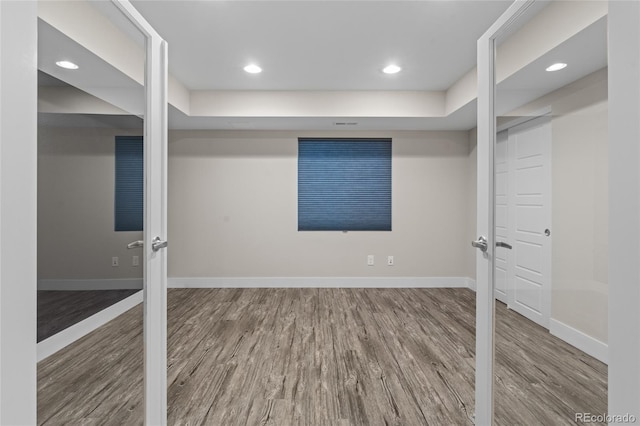 3384 Cranston Cir, Highlands Ranch, CO 80126 - finished basement featuring wood finished floors, baseboards, and recessed lighting