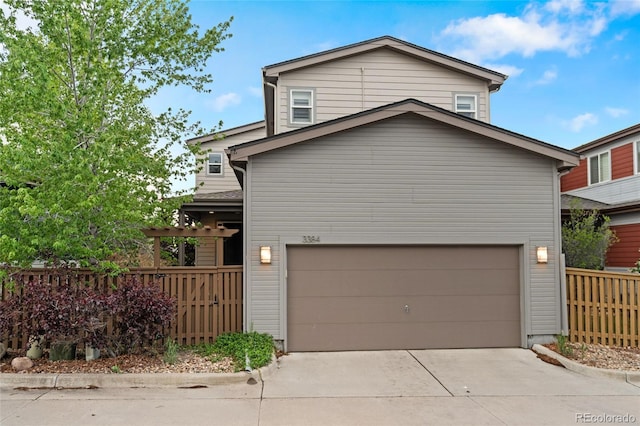 3384 Cranston Cir, Highlands Ranch, CO 80126 - view of front of house with concrete driveway and fence