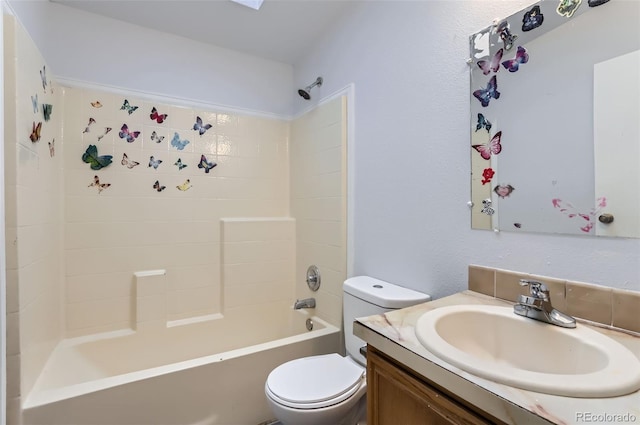 full bathroom with vanity, bathtub / shower combination, and toilet