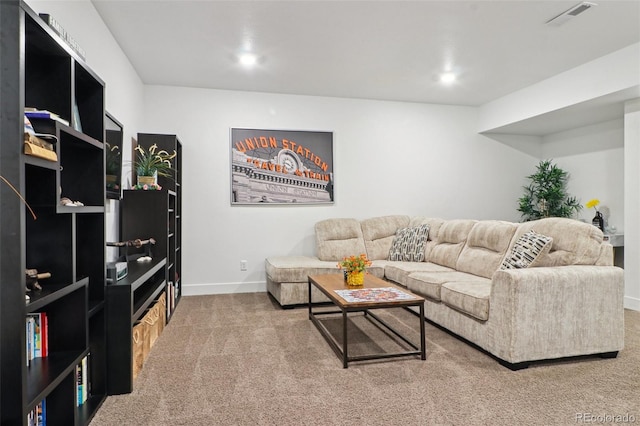 carpeted living room featuring visible vents, baseboards, and recessed lighting