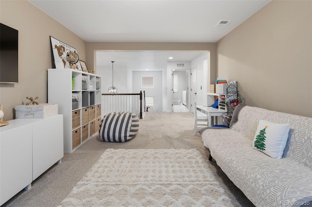 living room featuring light colored carpet