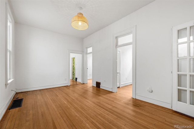 2841 Stout St, Denver, CO 80205 - spare room with light wood finished floors and baseboards