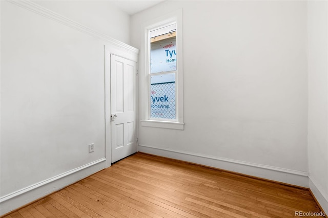 2841 Stout St, Denver, CO 80205 - unfurnished room featuring light wood-type flooring and baseboards