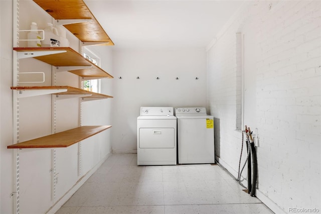 2841 Stout St, Denver, CO 80205 - washroom featuring light flooring and washer and dryer