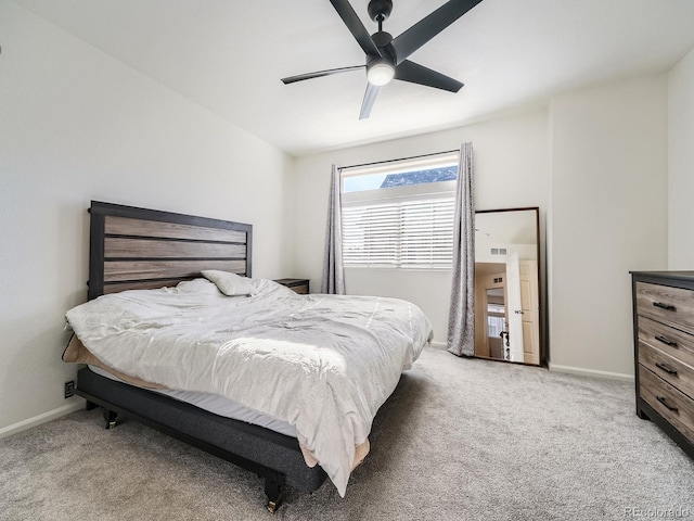 bedroom with ceiling fan and carpet floors