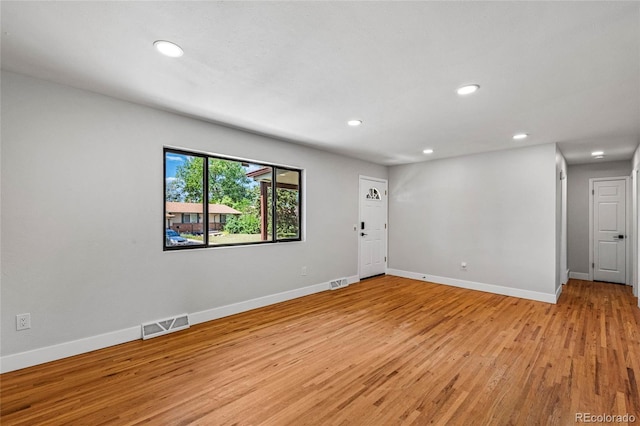 8580 Wiley Cir, Westminster, CO 80031 - empty room with light wood finished floors and recessed lighting