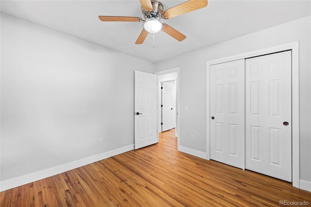 8580 Wiley Cir, Westminster, CO 80031 - unfurnished bedroom with wood finished floors, a closet, and a ceiling fan