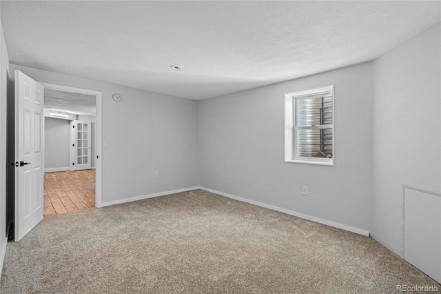 8580 Wiley Cir, Westminster, CO 80031 - carpeted spare room with a textured ceiling and baseboards