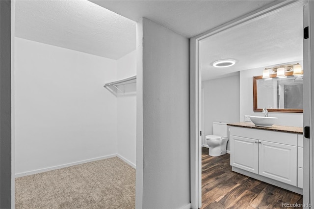 8580 Wiley Cir, Westminster, CO 80031 - bathroom with vanity and wood finished floors
