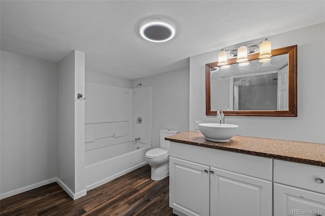 8580 Wiley Cir, Westminster, CO 80031 - bathroom featuring vanity, wood finished floors, and  shower combination