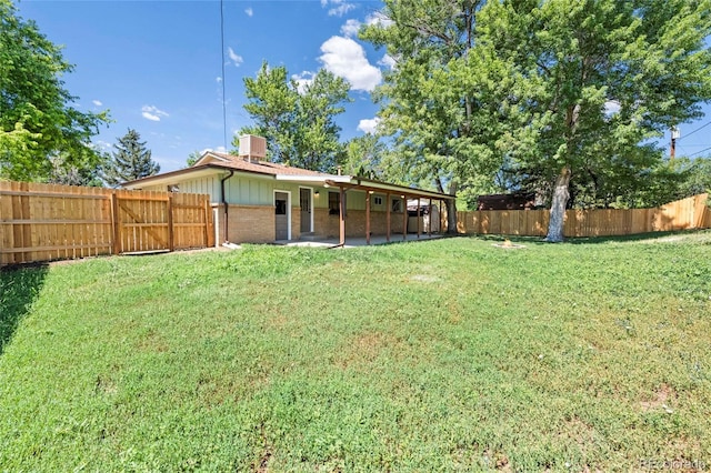 8580 Wiley Cir, Westminster, CO 80031 - fenced backyard with a patio area