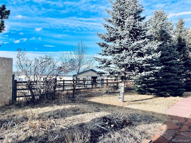 view of yard with fence