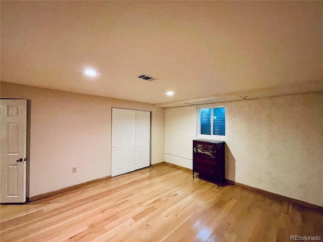 7194 S Himalaya Way, Centennial, CO 80016 - unfurnished bedroom with light wood finished floors and recessed lighting