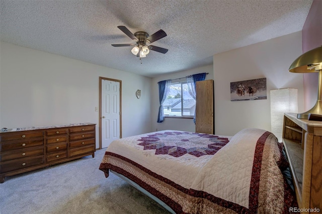 4987 Fabray Ln, Colorado Springs, CO 80922 - bedroom featuring carpet flooring, a textured ceiling, and a ceiling fan