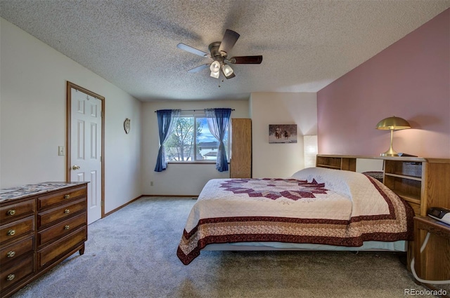4987 Fabray Ln, Colorado Springs, CO 80922 - carpeted bedroom with a textured ceiling and ceiling fan
