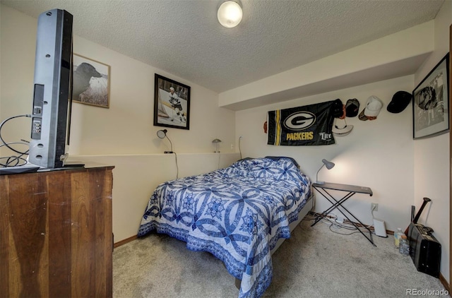 4987 Fabray Ln, Colorado Springs, CO 80922 - carpeted bedroom with a textured ceiling and baseboards