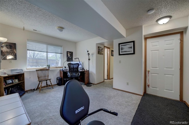 4987 Fabray Ln, Colorado Springs, CO 80922 - workout room with a textured ceiling, carpet flooring, and baseboards