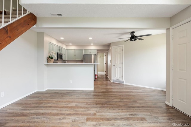 13873 E Lehigh Ave Unit B, Aurora, CO 80014 - unfurnished living room with a ceiling fan, light wood-type flooring, and recessed lighting