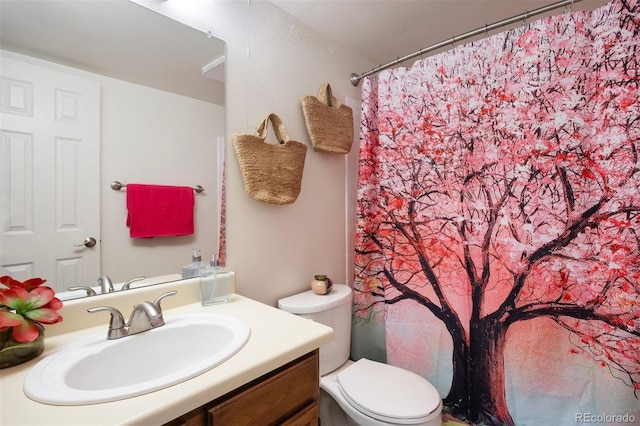 13873 E Lehigh Ave Unit B, Aurora, CO 80014 - bathroom with vanity and toilet