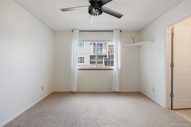 13873 E Lehigh Ave Unit B, Aurora, CO 80014 - unfurnished room featuring a textured ceiling, ceiling fan, and carpet