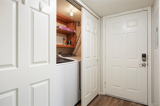 13873 E Lehigh Ave Unit B, Aurora, CO 80014 - laundry area with washing machine and clothes dryer, dark wood-style flooring, and a textured ceiling