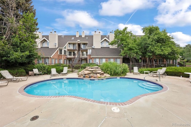 13873 E Lehigh Ave Unit B, Aurora, CO 80014 - community pool featuring a patio