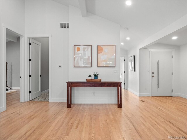 3049 S Vine St, Denver, CO 80210 - hall with light wood-style floors, recessed lighting, baseboards, and high vaulted ceiling