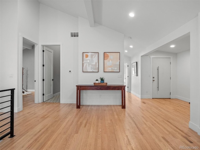 3049 S Vine St, Denver, CO 80210 - interior space featuring baseboards, light wood-style floors, recessed lighting, high vaulted ceiling, and beam ceiling