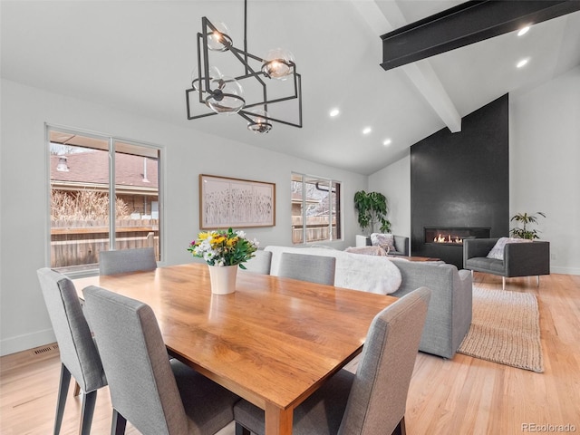 3049 S Vine St, Denver, CO 80210 - dining area featuring a chandelier, light wood finished floors, baseboards, a large fireplace, and recessed lighting