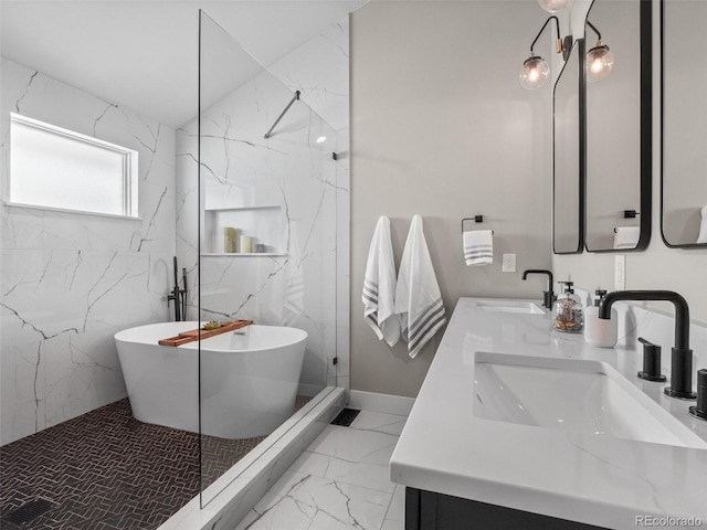 3049 S Vine St, Denver, CO 80210 - bathroom with a freestanding bath, double vanity, marble finish floors, and a marble finish shower