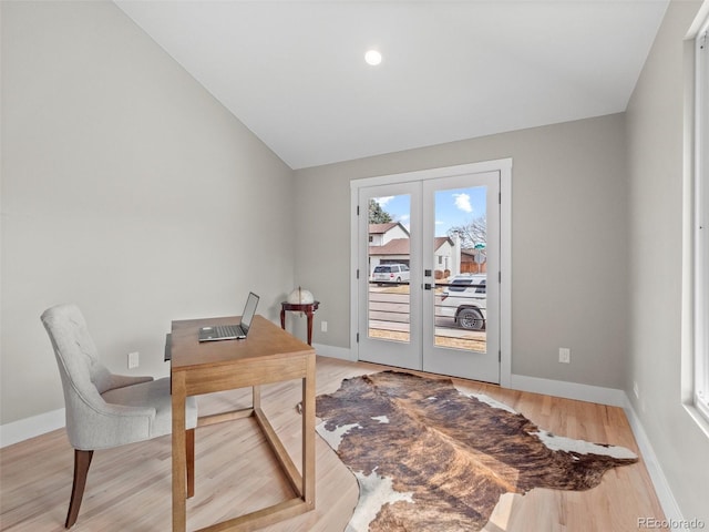 3049 S Vine St, Denver, CO 80210 - office space featuring french doors, lofted ceiling, baseboards, and light wood finished floors