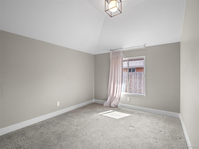 3049 S Vine St, Denver, CO 80210 - carpeted empty room with lofted ceiling and baseboards