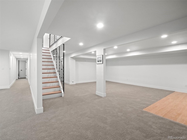 3049 S Vine St, Denver, CO 80210 - finished basement with stairs, carpet flooring, baseboards, and recessed lighting