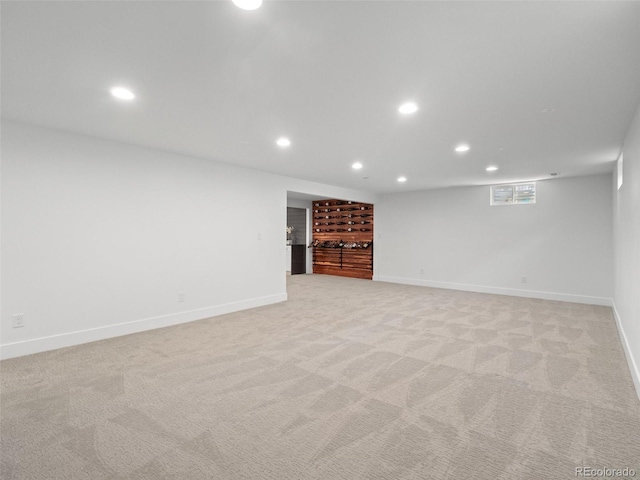 3049 S Vine St, Denver, CO 80210 - basement featuring recessed lighting, light colored carpet, and baseboards