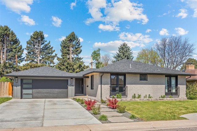 3049 S Vine St, Denver, CO 80210 - view of front of property featuring driveway, an attached garage, brick siding, roof with shingles, and a chimney
